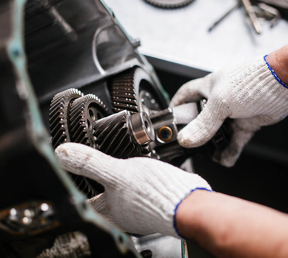 Cross-section of a car gearbox. mechanics work in the garage